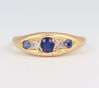 An 18ct yellow gold sapphire and diamond ring, the sapphires approx. 0.26ct, the diamonds 0.06ct, size N,  3.2 grams