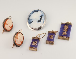 A silver mounted oval cameo portrait brooch, a pair of silver cameo earrings, 2 gilt metal mounted earrings and a pendant 