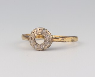 An 18ct yellow gold ring (lacking stones), size K 1/2, 3 grams 