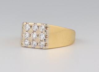 A gentleman's 18ct yellow gold 9 stone diamond ring, approx. 0.5ct, size Q, 6.6 grams 