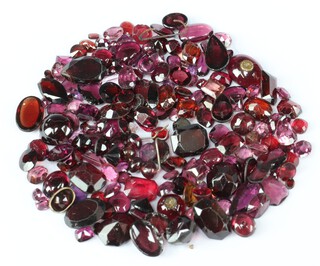 A quantity of loose polished garnets