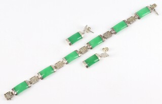 A Chinese silver and green hardstone bracelet 18cm and earrings 