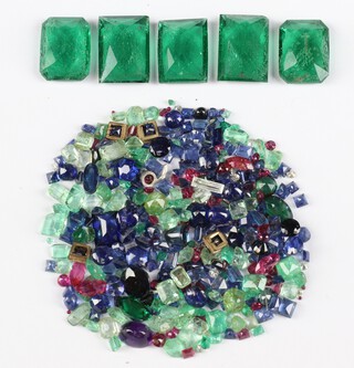 A small quantity of loose polished stones including diamonds, emeralds, rubies etc 