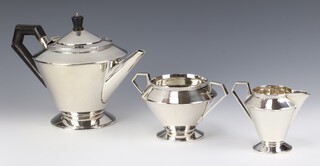 An Art Deco silver 3 piece tea set with ebony mounts Sheffield 1932, maker James Dixon & Sons 756 grams gross 