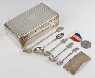 A rectangular silver engine turned cigarette box Birmingham 1920 16cm, a crescent shaped card case, 5 teaspoons and medallion 