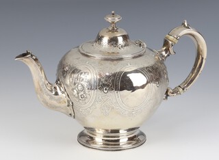 A Victorian repousse silver bachelor's teapot with floral panels, Chester 1864, makers Edward & John Barnard gross weight 424 grams, having ivory resistors, Ivory Exemption Certificate No. 1ZDAJ6KK 