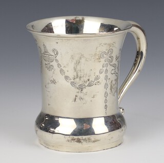 An Edwardian silver mug with swags and scrolls, 72 grams, 8cm, rubbed marks 