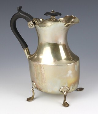 An Edwardian silver coffee pot raised on pad feet with ebony mounts, London 1902, 20cm 488 grams 