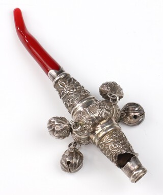 A silver whistle/rattle with coral teether 