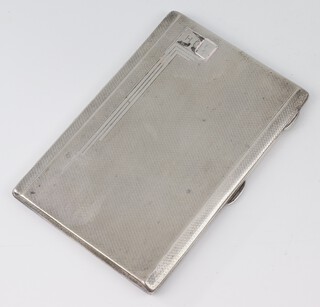 A silver engine turned cigarette case with monogram, Birmingham 1934, gross weight 186 grams 