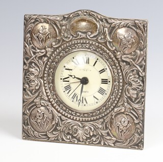 A 925 standard silver repousse Victorian style watch case with quartz movement 12cm 