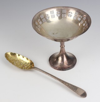 A Georgian silver berry table spoon rubbed marks and a silver tazza Birmingham 1922, 134 grams 