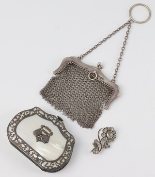 A 925 standard silver mesh purse, a ditto paste brooch and a silver mounted mother of pearl purse 