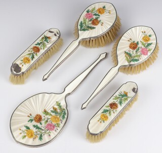 A silver guilloche enamel dressing table set comprising hand mirror, 2 hair brushes and 2 clothes brushes, decorated with flowers, Birmingham 1936 maker Henry Clifford Davis 