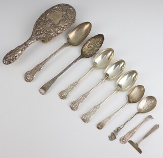 A Victorian silver Kings pattern table spoon Glasgow 1891, 8 other items of cutlery and a silver backed hairbrush, weighable silver 458 grams 