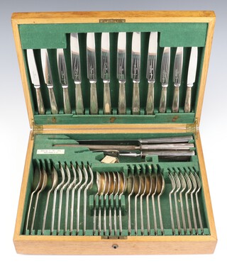 A canteen of silver plated cutlery for 6, contained in a Liberty & Co oak canteen box, lacking 1 table spoon 