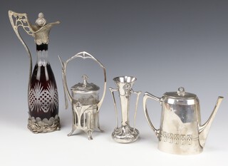 A Continental silver plated WMF preserve pot with plated stand, cover and fork and having a clear glass liner, together with a similar teapot, repousse vase and a silver plated mounted Bohemian claret jug 