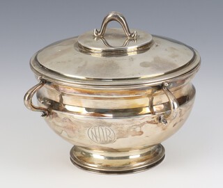 An Arts and Crafts circular silver cup and cover with engraved monogram Sheffield 1908, maker Lee and Wigfull 386 grams, 17cm