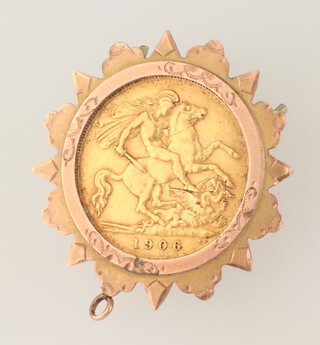 A half sovereign 1906, in a 9ct yellow gold mount with metal pins, gross weight including pin 5.7 grams