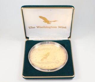 A Washington Mint silver gilt Giant Quarter Pound Golden Proof coin 4oz boxed