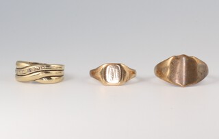 A gentleman's 9ct yellow gold signet ring size K, another size K and a twist ring size P 6.4 grams 