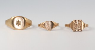 Three 9ct yellow gold signet rings sizes J, J and S, 6 grams 