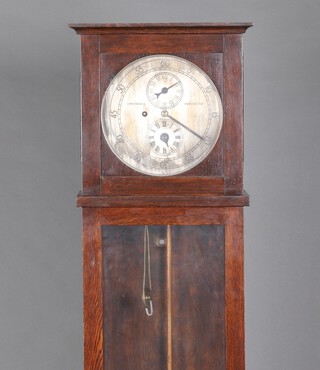 Armstrongs Manchester, a regulator longcase clock, the 25cm silvered dial with minute dial and Roman numeral hour dial, contained in an oak case 169cm, complete with key, pendulum (bolt to bottom missing), weight and retaining bolt 