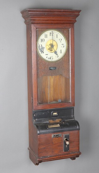 A clocking in clock, the 23cm painted dial with Arabic numerals, marked Made in England 378, contained in an oak case 120cm x 43cm x 26cm