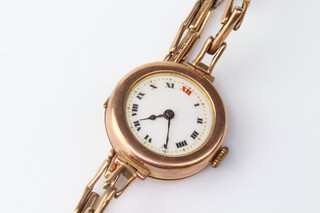 A lady's 9ct yellow gold wristwatch 25mm, on a ditto expanding bracelet, gross weight including movement and springs 16 grams 