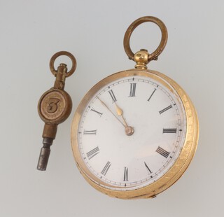 A lady's 18ct yellow gold cased fob watch with engraved 35m case, gross weight including glass and movement 37.7 grams 