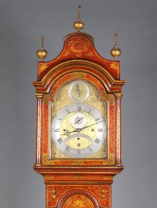 An 18th/19th Century 8 day striking longcase clock with grand sonnerie movement striking on 8 graduated bells and a gong, the 30.5cm arched brass dial marked Henry Mills Chippenham, with silent/strike dial, minute indicator, calendar aperture and gilt spandrels, contained in a red lacquered painted case, the door and base with printed scenes of tavern interiors, 242cm h, complete with wooden pendulum and 3 brass cased weights 