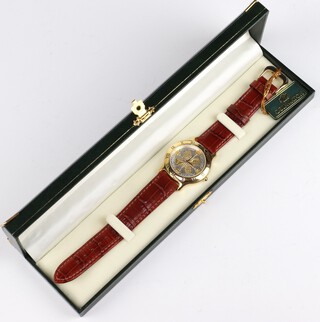 A gentleman's coin watch, the dial in the form of a 1936 florin on a leather strap, with original box 