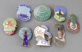 Eight Butlins enamelled badges - Clacton 1950 marked B Ham Medal Co, and 1955, Pwllheli 1951 marked Firmin and 1953, Butlins Filey 1957 in the form of a lighthouse marked J R Gaunt, Butlins Filey 1957 in the form of a seahorse marked J R Gaunt, Margate 1960 marked J R Gaunt and Minehead 1963 marked J R Gaunt