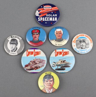 Eight 1960's badges - The Beatles Ringo, W.I.N. Sam, 2 Captain Scarlet vehicle badges, 2 Captain Scarlet badges, badge of Captain Scarlet, ditto Colonel White, Ever Ready Solar Spaceman badge and a Drings Pork Sausages badge 