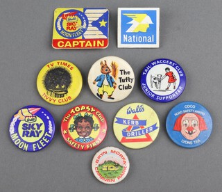 Ten metal badges - The Tufty Club, The Junior Tail Waggers Supporters Club, The Topsy Safety First Club, Bryn Morfa Caravan Club Conway, TV Times Tivvy Club, Lions Tea Coco Road Safety Award, Walls Ice Cream Sky Ray Captain Badge, Walls Sky Ray Moon Fleet badge, Walls Curve Drill badge and a National Petrol badge 