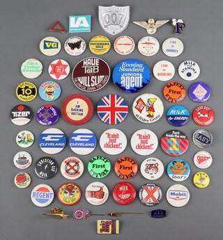 A large collection of various badges 