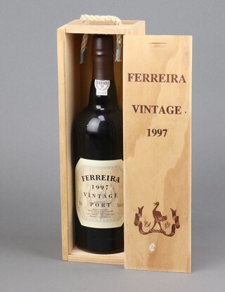 A bottle of Ferreira 1997 vintage port, contained in a wooden box 