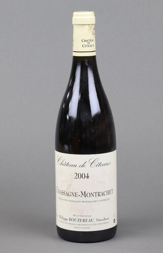 A bottle of Chateau de Citeaux Chassagne-Montrachet 2004 red wine 