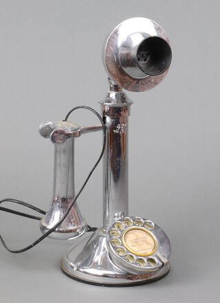 A reproduction GEC 50 chrome candlestick telephone 