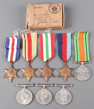 Four Second World War campaign stars - 1939-49, Africa, Italy  France and Germany together with 2 Defence medals and 2 British War medals and posting box marked V J Nailn