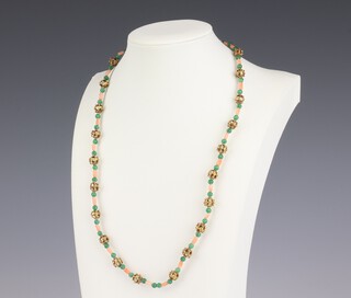 A yellow metal, testing as 14ct, coral and jade necklace with pierced gold spacers, 51cm 