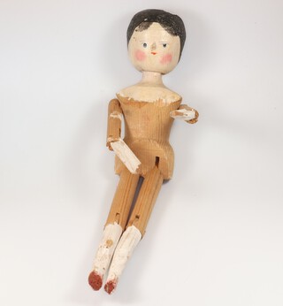 A 19th Century Grodnertal style painted wooden peg doll with articulated limbs 28cm 