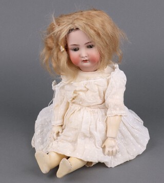 Kammer & Reinhardt/Simon and Halbig, an early 20th Century  bisque porcelain walking doll with weighted eyes, open mouth and upper teeth, head impressed Simon and Halbig 403 Germany, 45cm 