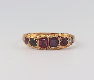 An Edwardian 15ct yellow gold 6 stone amethyst, garnet, emerald  and diamond set ring, size Q, 1.6 grams