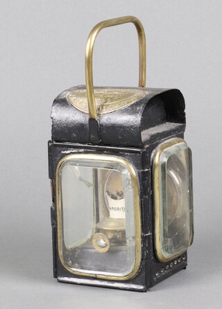 Merryweather & Sons, a Japanned metal and brass fire engine hand lantern complete with burner 15cm x 8cm x 7cm (crack to the glass at the side) 