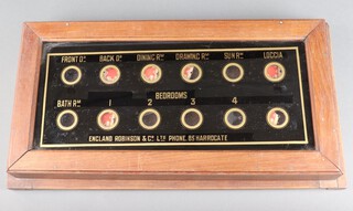 England Robinson & Co. Ltd, Harrogate, a servants indicator board with 12 apertures 9cm x 53cm x 28cm 