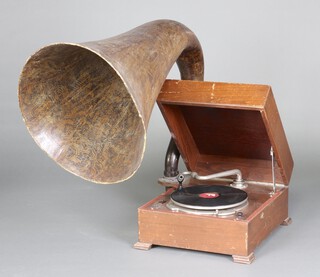 An electric EMG Handmade Gramophone Mark IX circa 1932, with 22inch diameter papier mache horn, copper Grape Street plaque stating model 495, contained in fitted oak case, missing soundbox/pickup, electrics are untested