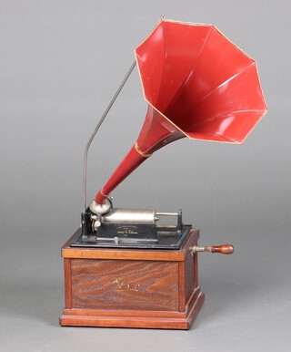 An Edison Fireside phonograph Model A, serial number 18090 (likely made up)  together with a red Fireside horn and a collection of 30 wax cylinders