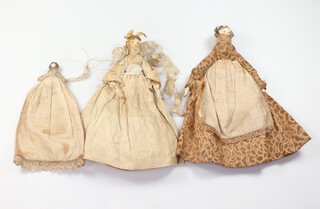 Three 19th Century painted peg dolls 2 x 9cm (with articulated limbs) and 3cm (sizes excluding dress) 