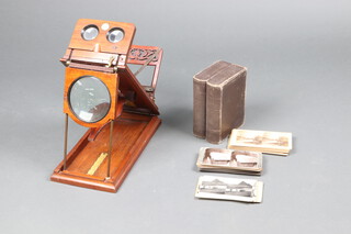 A Rowsell's Patent Graphoscope and Stereoscope in a mahogany case, marked Rowsell's Pat.  together with 99 Underwood and Underwood slides of Egypt in faux twin volume case, 3 Keystone View Company slides, 2 Realistic Travel slides, 2 FJ Jarvis slides and 35 other unnamed slides 